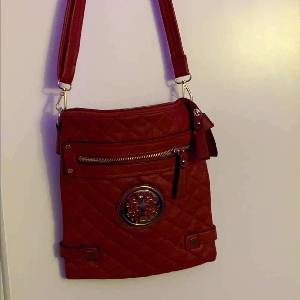 Deep red purse with detachable chain